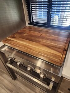 rv kitchen extra counter space cutting board hack